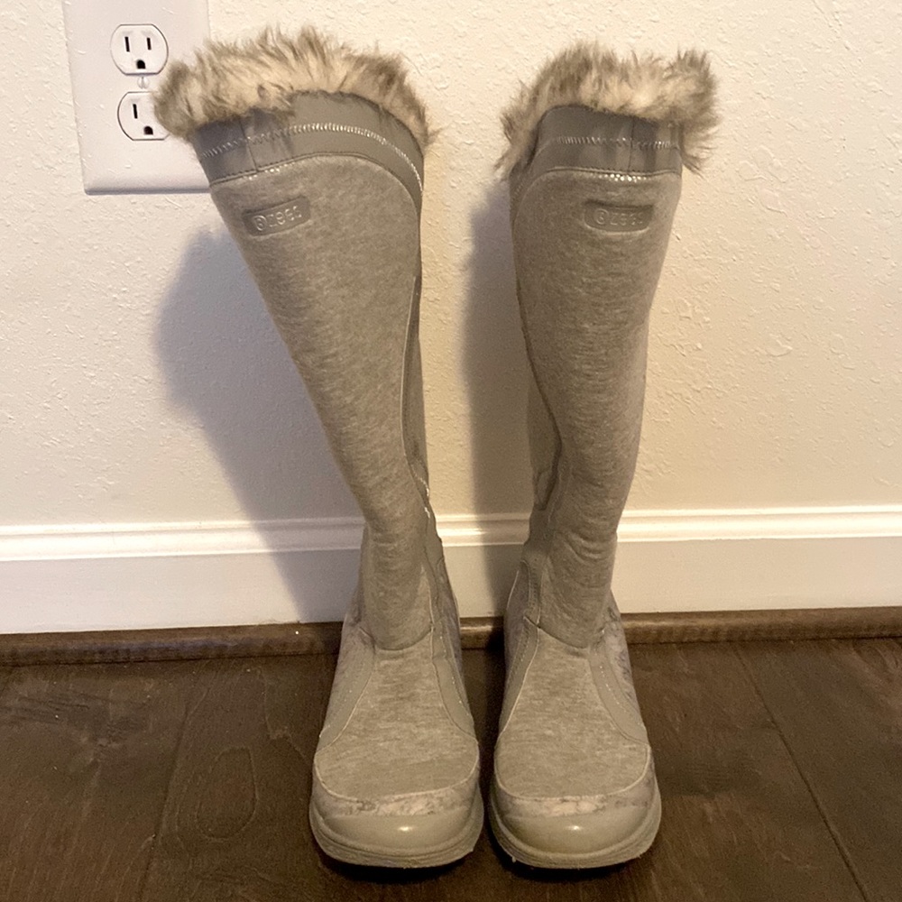 I am selling long boots for the winter and they are grey.